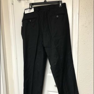 Van Heusen Dress pants, Brand new never worn size 34 W 32 L Black color
